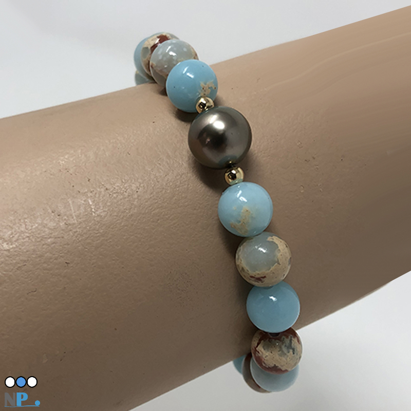 Bracelet très tendance, bijou de qualite composé d'une perle de Tahiti Ø : 10 mm - Qualite AAA avec Pierre semi precieuse Sediments de la Mer bleue